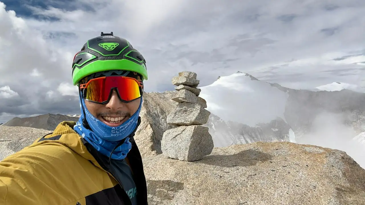 Climber on the summit ridge of Chhuama IV, a 6,179-metre peak in the Mustang region of Nepal, during the first recorded ascent in July 2026.